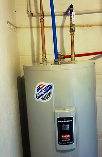 https://attadalehotwater.com.au/uploads/2025/06/electric-hot-water-system-32554.jpg